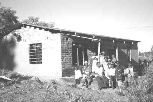 Alima John with household of 11, Malawi.