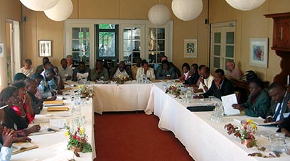 Burundi Round Table photo on cover for www.iofc.org/highlights