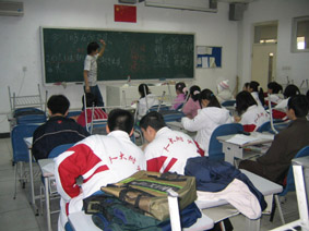 Yashikazu Kato teaching Japanese in Beijing