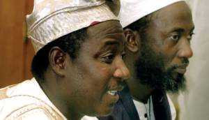 Imam and pastor photo on cover for www.iofc.org/highlights