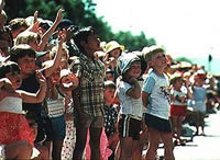 Young Australians watch a parade