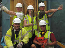 Habitat volunteers get to work on a house in Britain (photo: HFH)