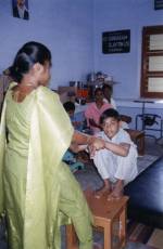 Suresh, aged 7 is treated for his disabilities