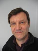 Mug shot of Mike Smith, Associate Editor, For A Change magazine. Joint Co-ordinator, UK, Caux Initiatives for Business.