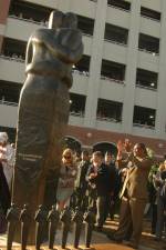 Rev. Tee Turner rejoices at unveiling of Reconciliation Statue. Karen Elliott-Greisdorf Photography